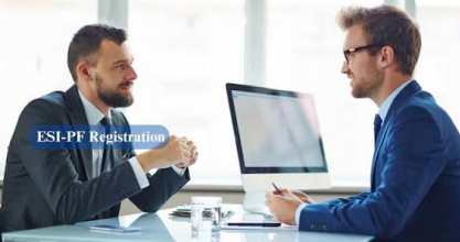 HR administrator checking ESI and PF compliance status on desktop